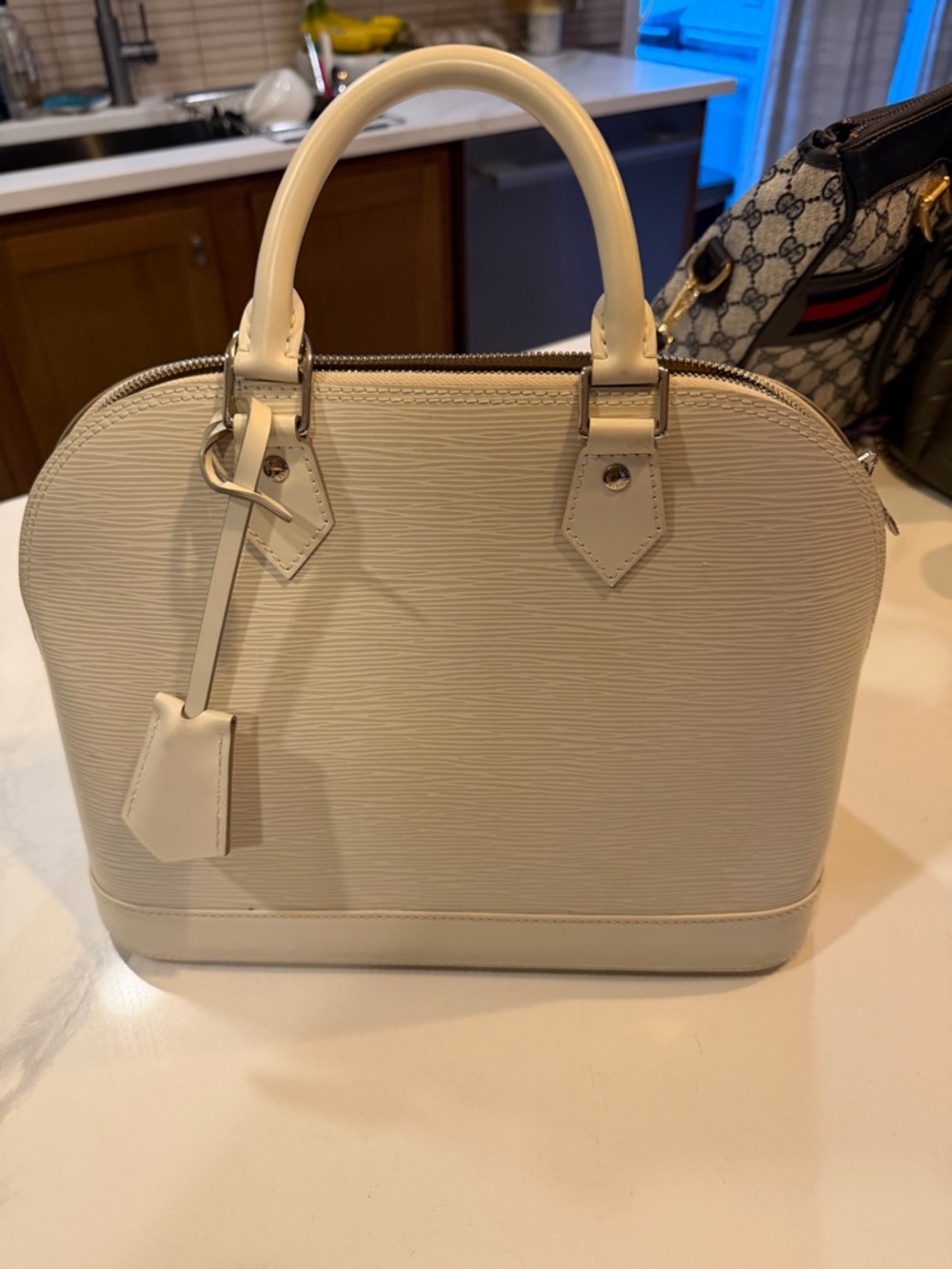 Louis Vuitton Cream Alma Epi Leather Satchel